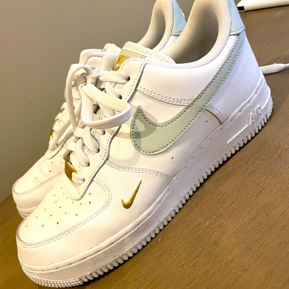 NIKE! Womens Air Force ones with gold detailing